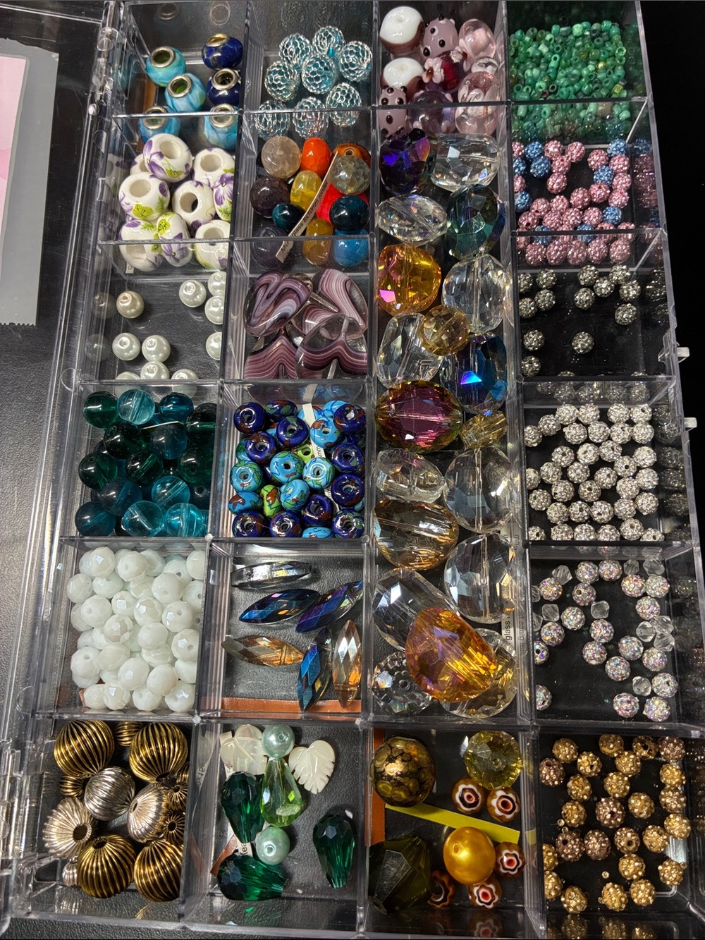 Assorted crystal and art beads with Multi-Compartment Jewelry & Craft Organizer